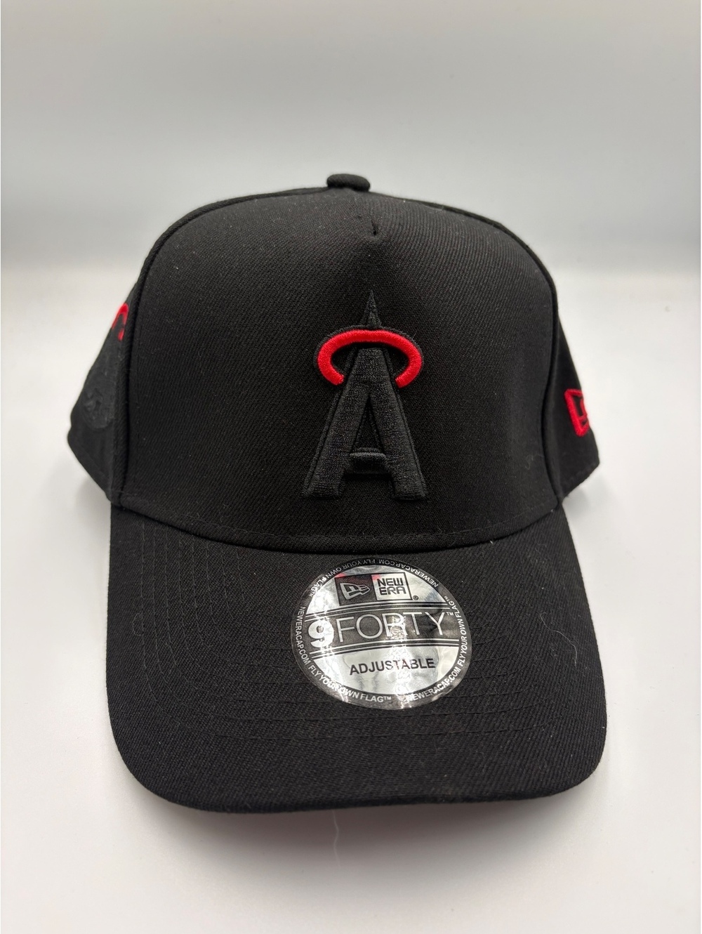 New Era 9FORTY Adjustable Black Baseball Cap with Red Accents